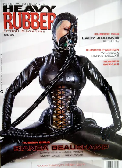 Bianca Beauchamp in black latex on the cover of a latex fashion magazine, issue 30