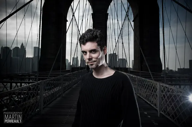 Martin Perreault standing on the Brooklyn Bridge