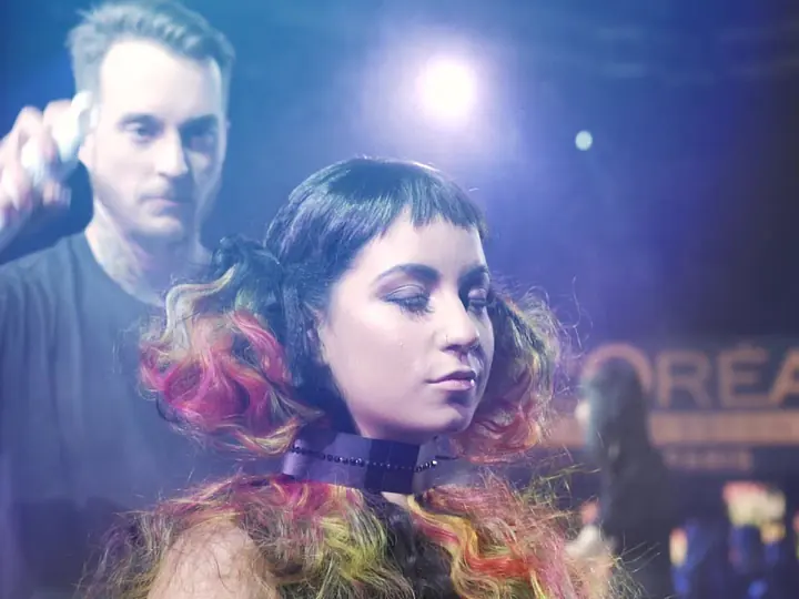 A stylist at work at L’Oréal Montreal Unplugged 2019, from the event film