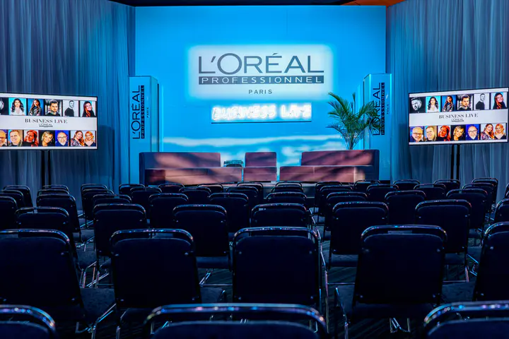 The L’Oréal Professionnel Business Live stage and its rows of chairs